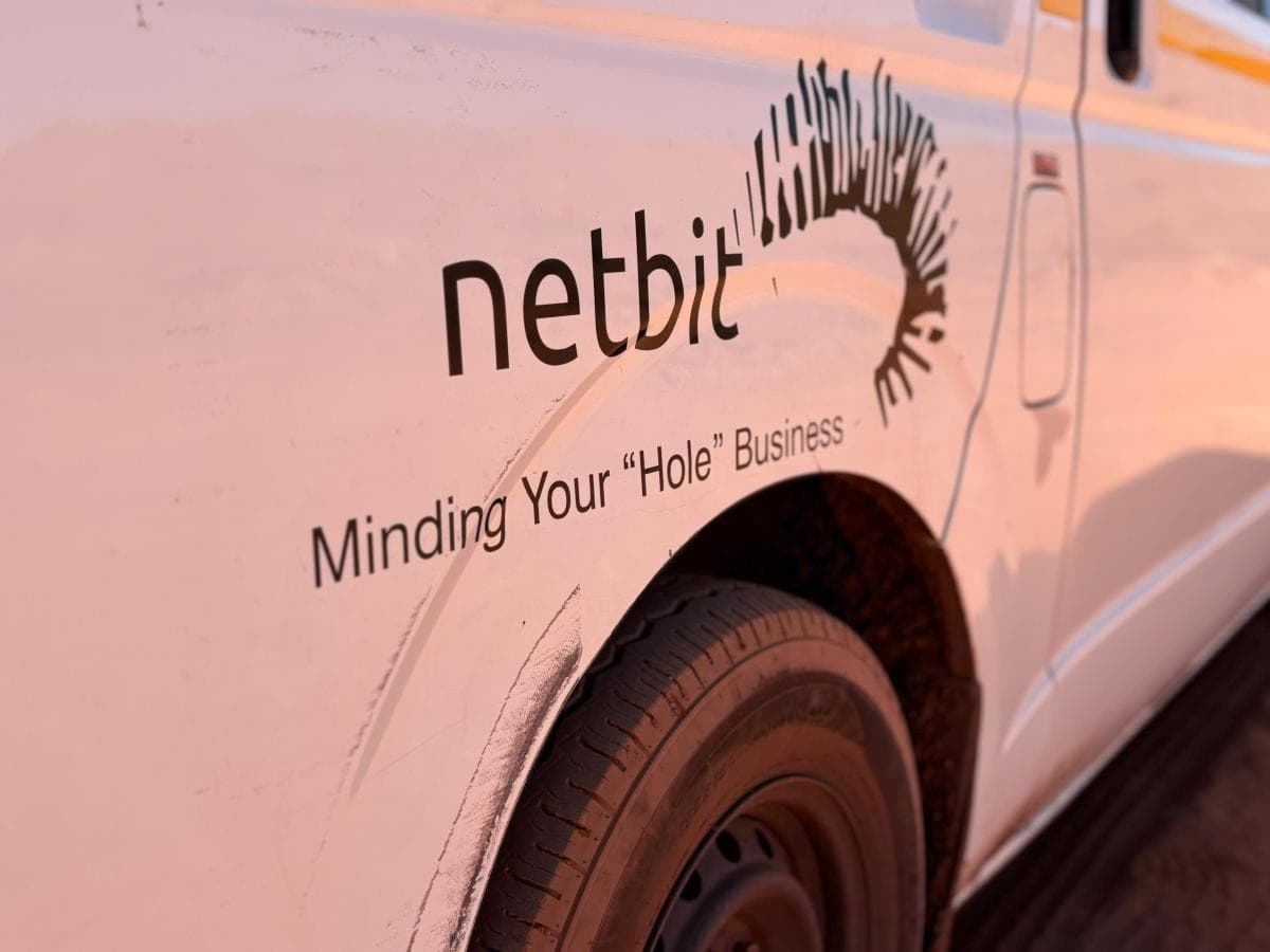 Close-up of a netbit-branded service vehicle on site, one of Nsimbi's distributor partners.
